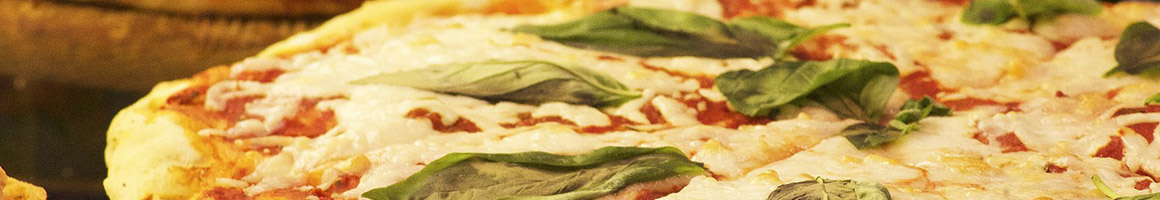 Eating Italian Pizza at Sicily's Pizza Gulfport restaurant in Gulfport, MS.